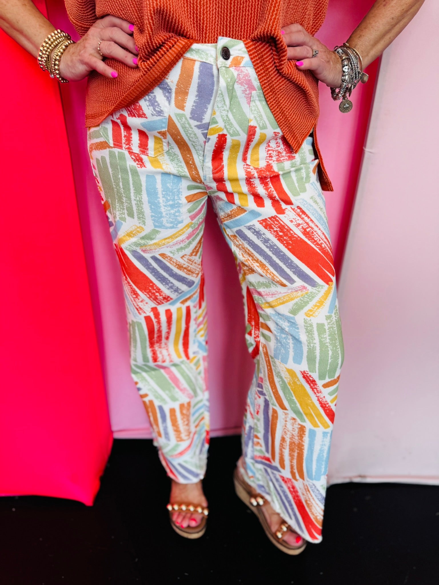 Pastel painted print wide leg jeans with colorful brushstroke design and cropped fit