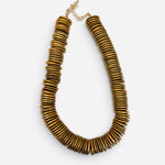 Antique gold statement necklace with stacked flat disc beads and adjustable chain.