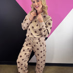 Ash mocha quarter-zip pullover with brown polka dots, long sleeves, and ribbed trim.
