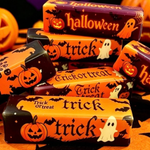 Halloween butter stick squishy toys with pumpkins, ghosts, bats, and trick-or-treat designs.