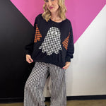 Oversized Halloween sweatshirt with three plaid ghost appliqués and raw-edge details.