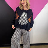 Oversized Halloween sweatshirt with three plaid ghost appliqués and raw-edge details.
