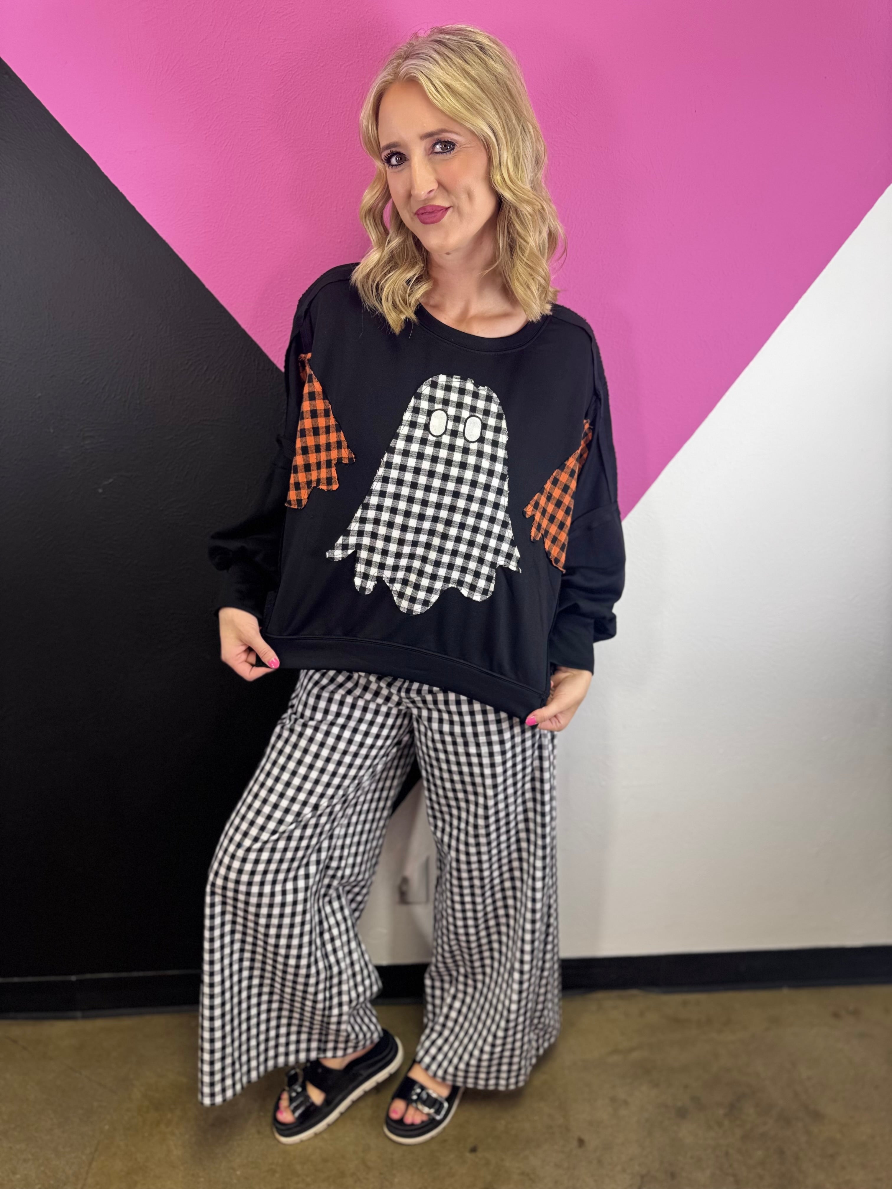 Oversized Halloween sweatshirt with three plaid ghost appliqués and raw-edge details.