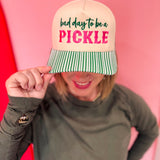 Cream pickleball hat with pink embroidery and green striped bill.