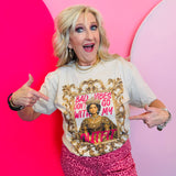 Graphic tee with baroque frame, pink lettering, and rhinestone accents reading bad vibes quote