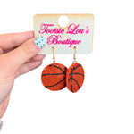 Basketball dangle earrings covered in sparkling rhinestones.