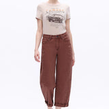 High-rise espresso brown barrel jeans with rolled cuffs and subtle side seams in a cropped fit.