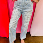 Light wash straight leg jeans with allover rhinestone embellishments and high-rise waist.