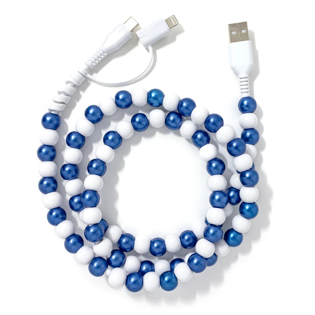 A stylish blue and white beaded phone charger cable.