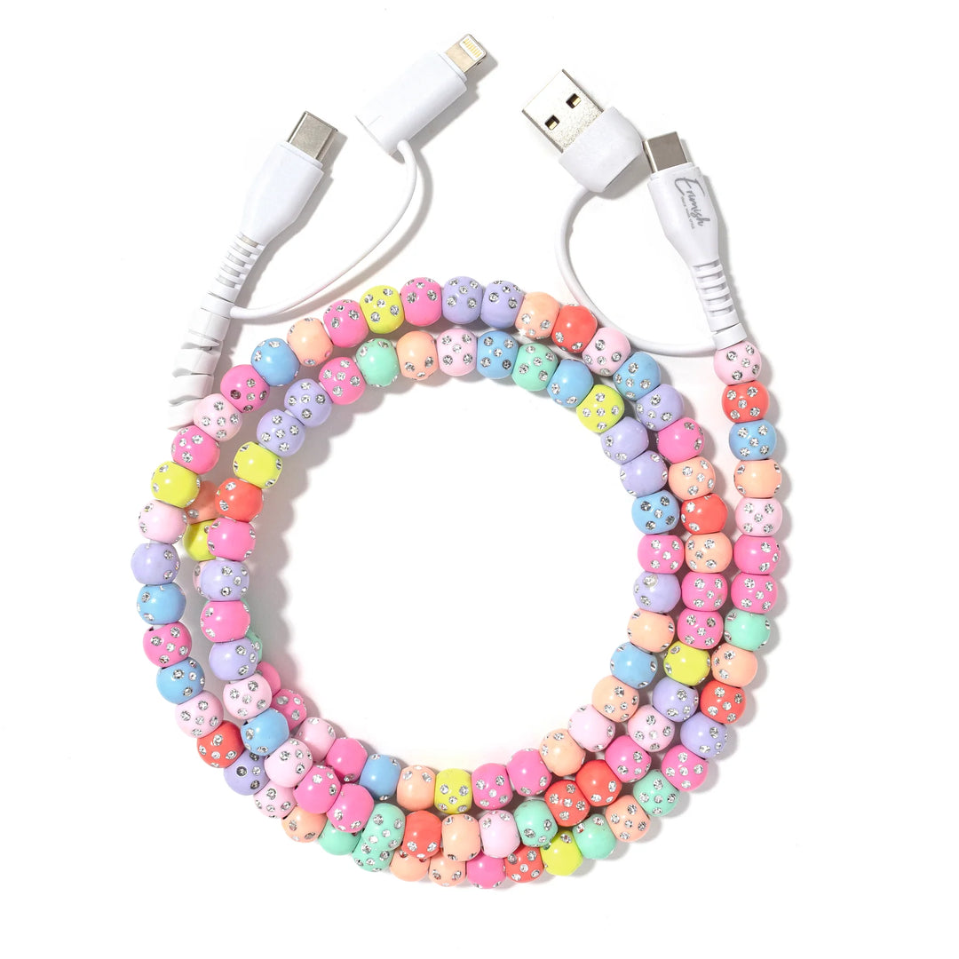 A vibrant, multi-colored beaded phone charger cable with pastel hues and rhinestones. 