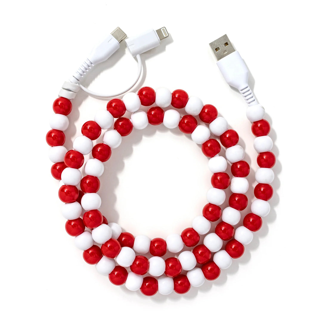 A vibrant red and white beaded phone charger cable.
