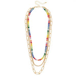 Layered gold necklace with rainbow beads paperclip chain and solid chain