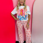 White Bee Kind graphic tee with colorful bee design and crystal rhinestone embellishments.