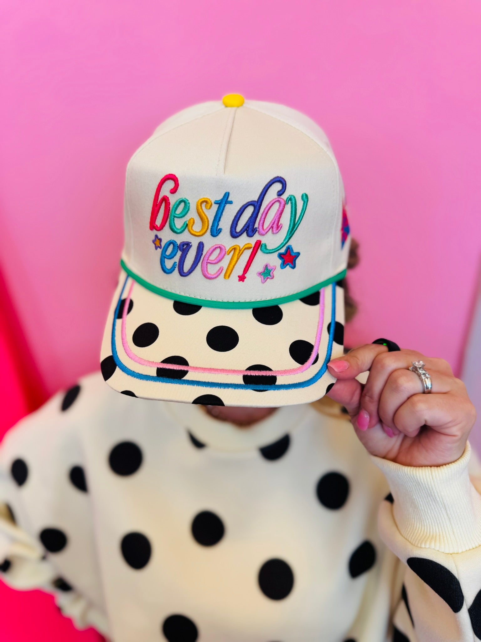 Best Day Ever hat with colorful embroidery, polka dot bill, and magic themed details.