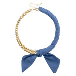 Denim bead scarf necklace with adjustable chain and statement design.