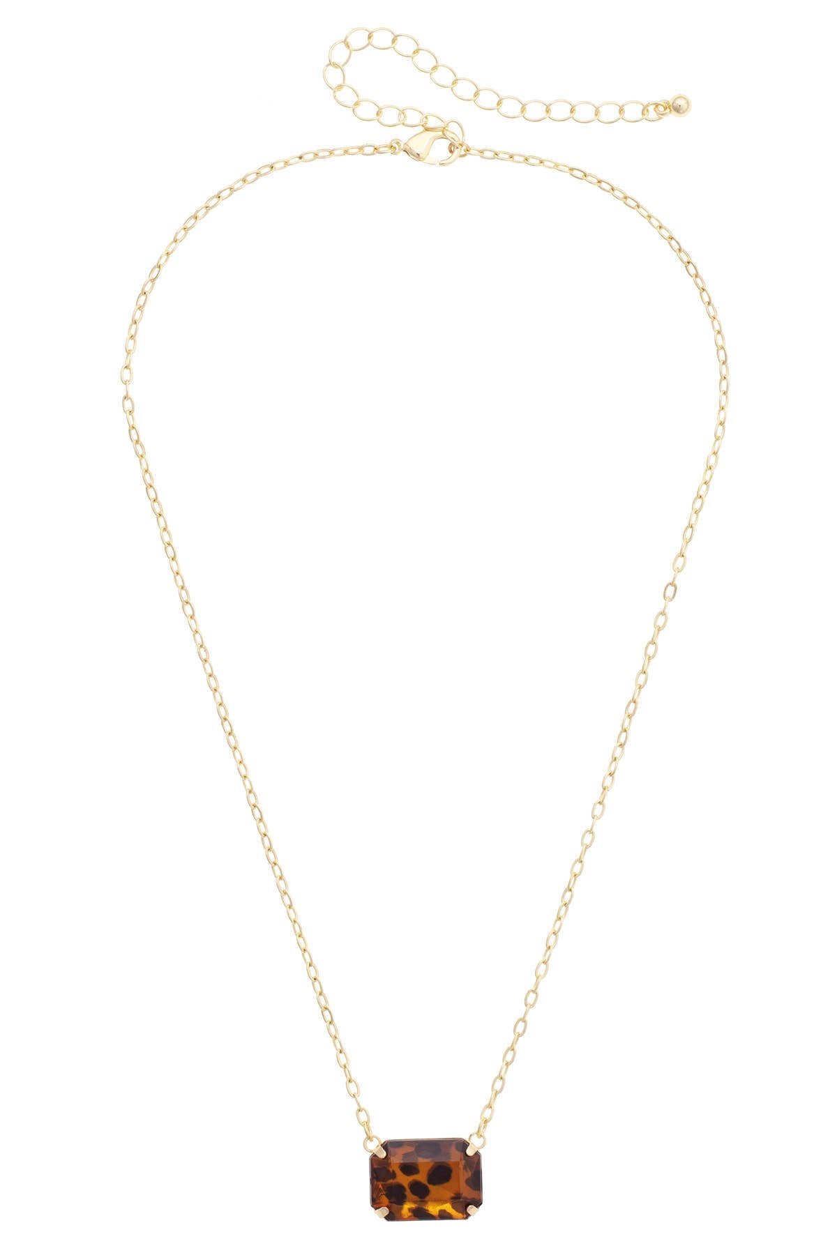 Tortoise-inspired pendant necklace with a shiny gold-tone chain.