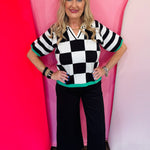 Black checkered short sleeve collared sweater top with ribbed hem