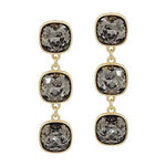 Black diamond crystal triple drop earrings with gold accents and elegant 2-inch dangle design.