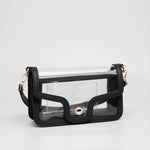Clear black game day shoulder bag with gold hardware, removable strap, and magnetic closure.