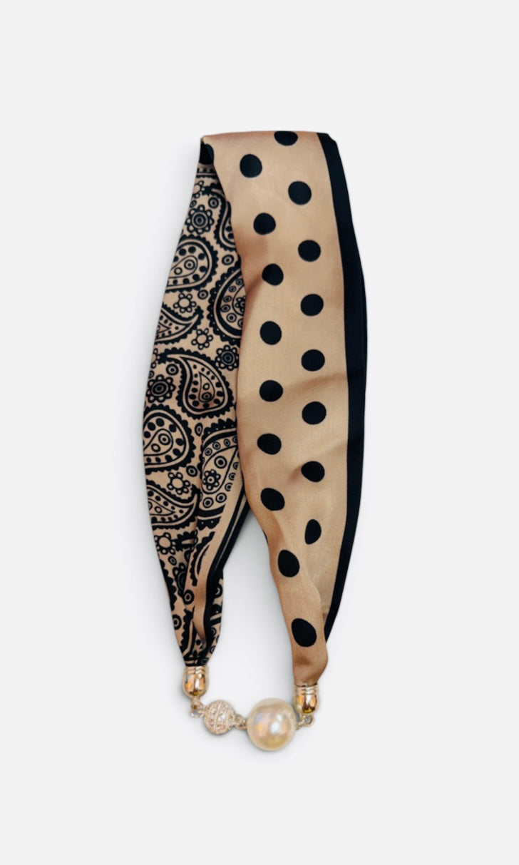 Black paisley and polka dot scarf necklace with pearl accent and sparkling magnetic closure.