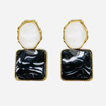 Black and pearl gold-tone resin dangle earrings