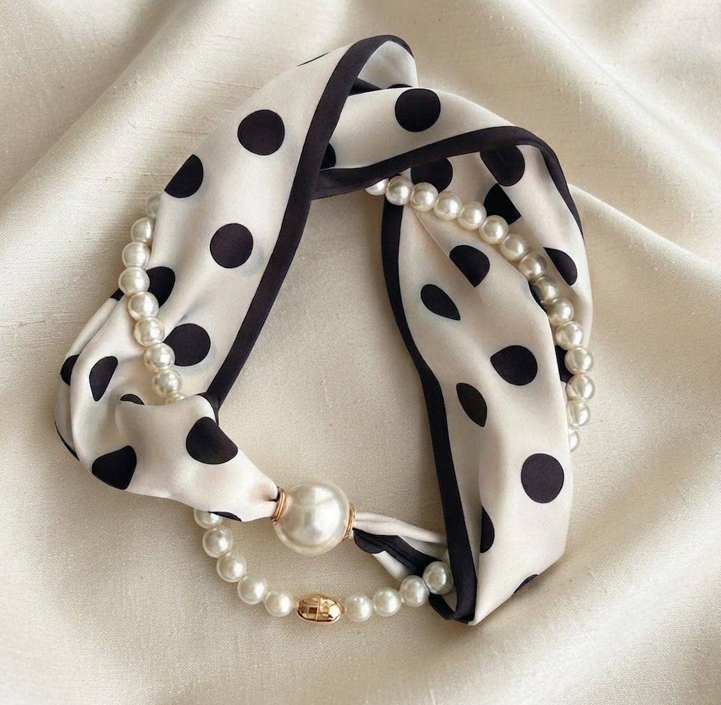 Black and white polka dot scarf necklace with lustrous pearl accents.