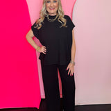 Black raised rib short sleeve tee and wide leg pants matching set.