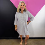 Black striped collared shirt dress with button front, chest pocket, and three-quarter sleeves