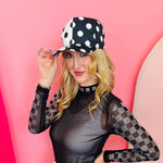 Black and white polka dot half design snapback hat.