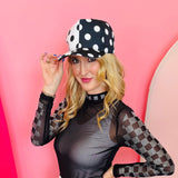 Black and white polka dot half design snapback hat.