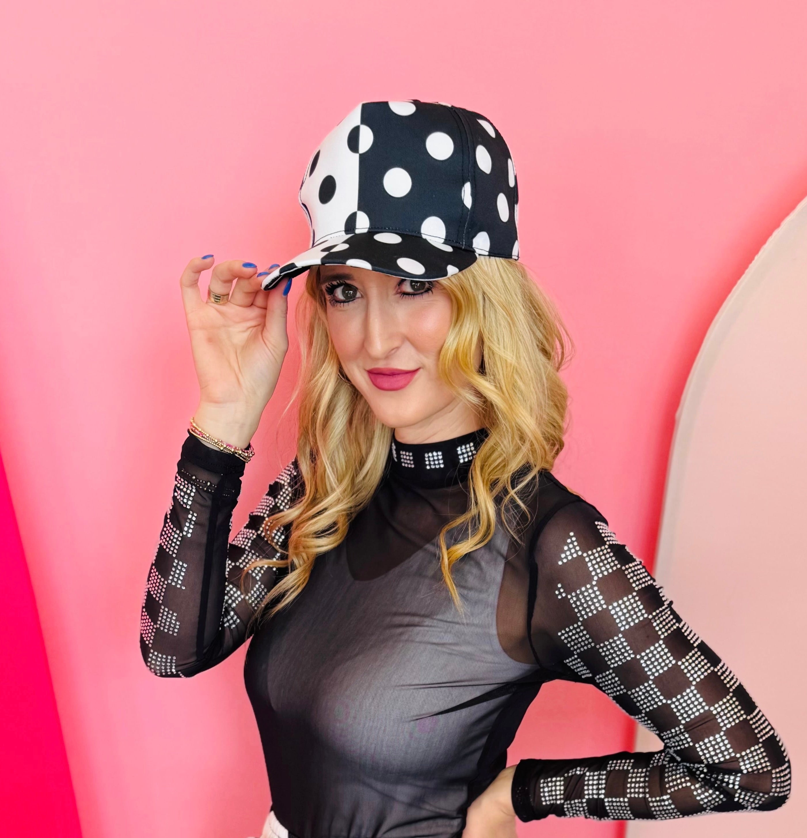 Black and white polka dot half design snapback hat.