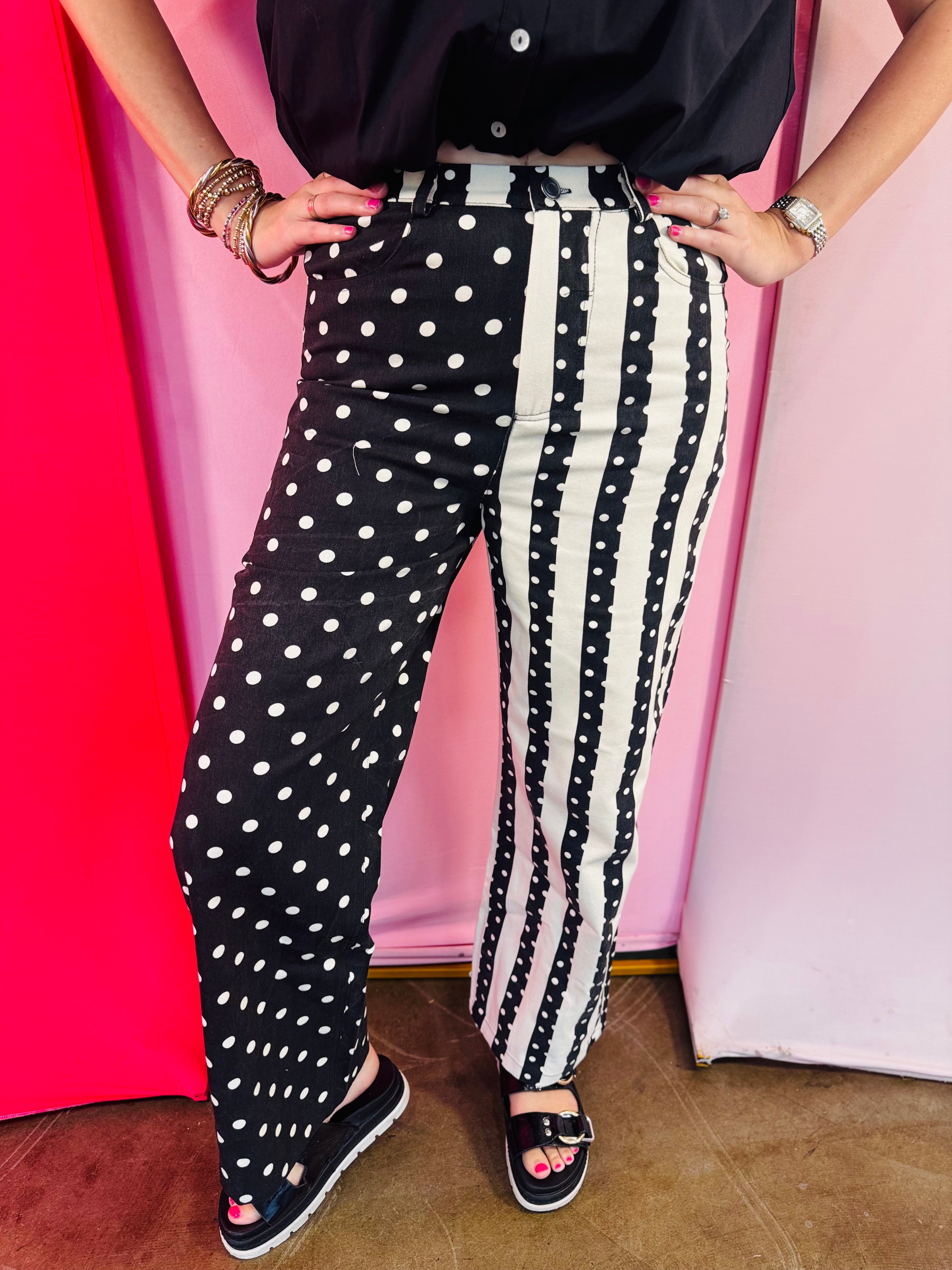 Black and white wide leg pants with polka dot and stripe panel design.