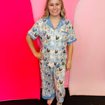 Blue chicken print pajama set with white polka dot collar and matching pants.