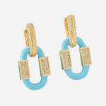Cornflower blue enamel oval earrings with gold rhinestone hoops and geometric design.