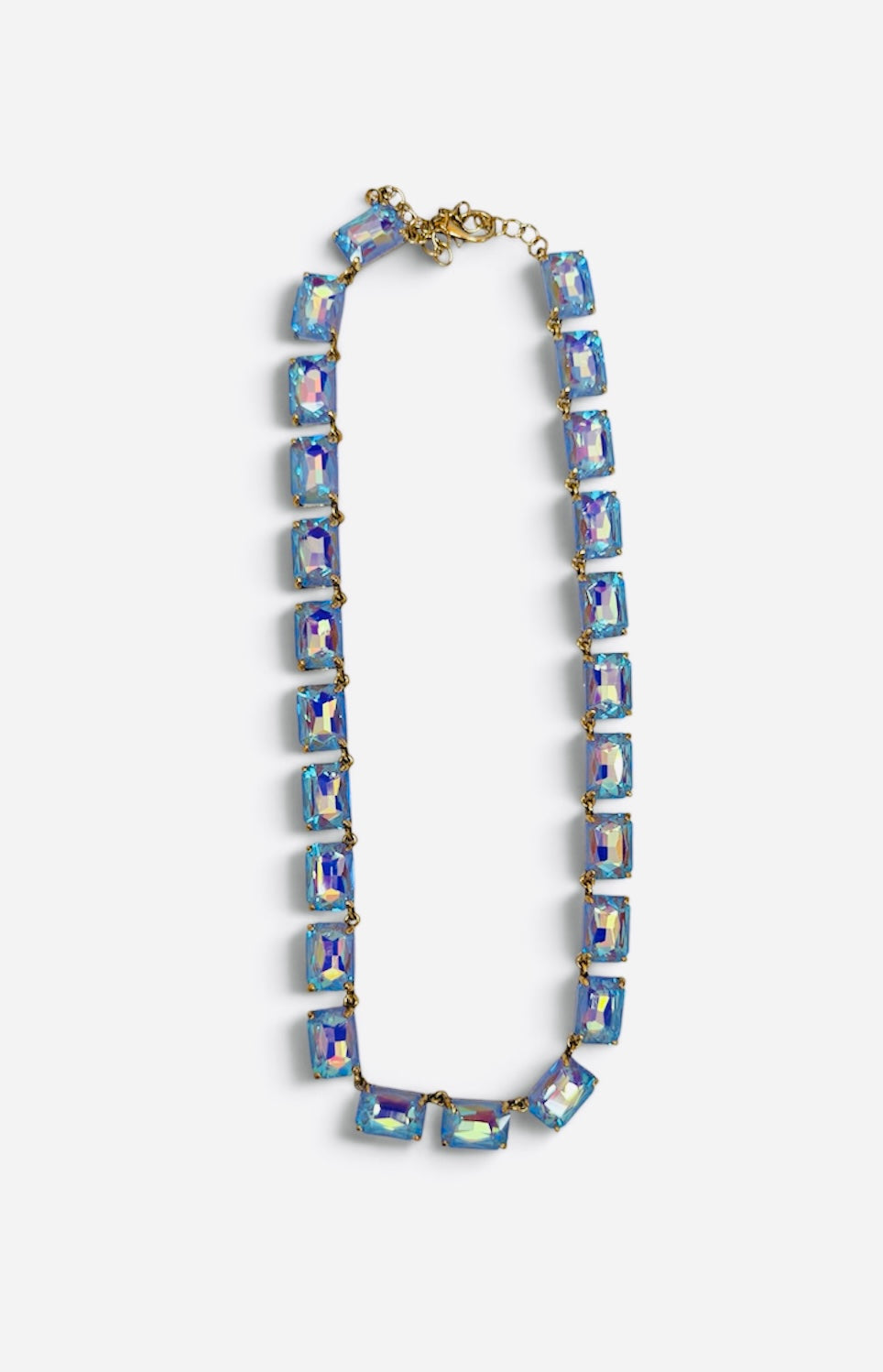Blue crystal necklace with faceted rectangular stones and shimmering iridescent finish.