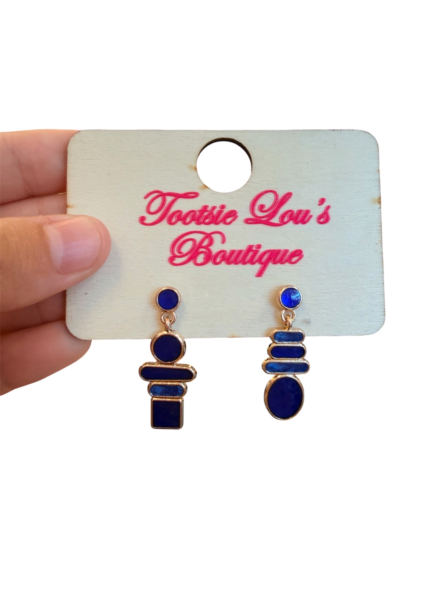 Navy blue and gold geometric mosaic earrings with mixed shapes and lightweight design.