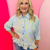 Blue and yellow striped peplum top with button front, collar, and three-quarter sleeves