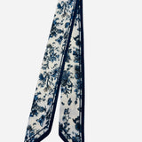 Ivory twilly scarf with navy floral and butterfly print.