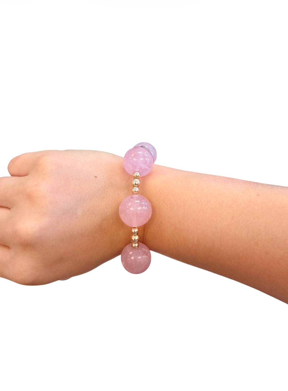 Blush pink bubble bracelet with oversized glossy beads and gold accents.