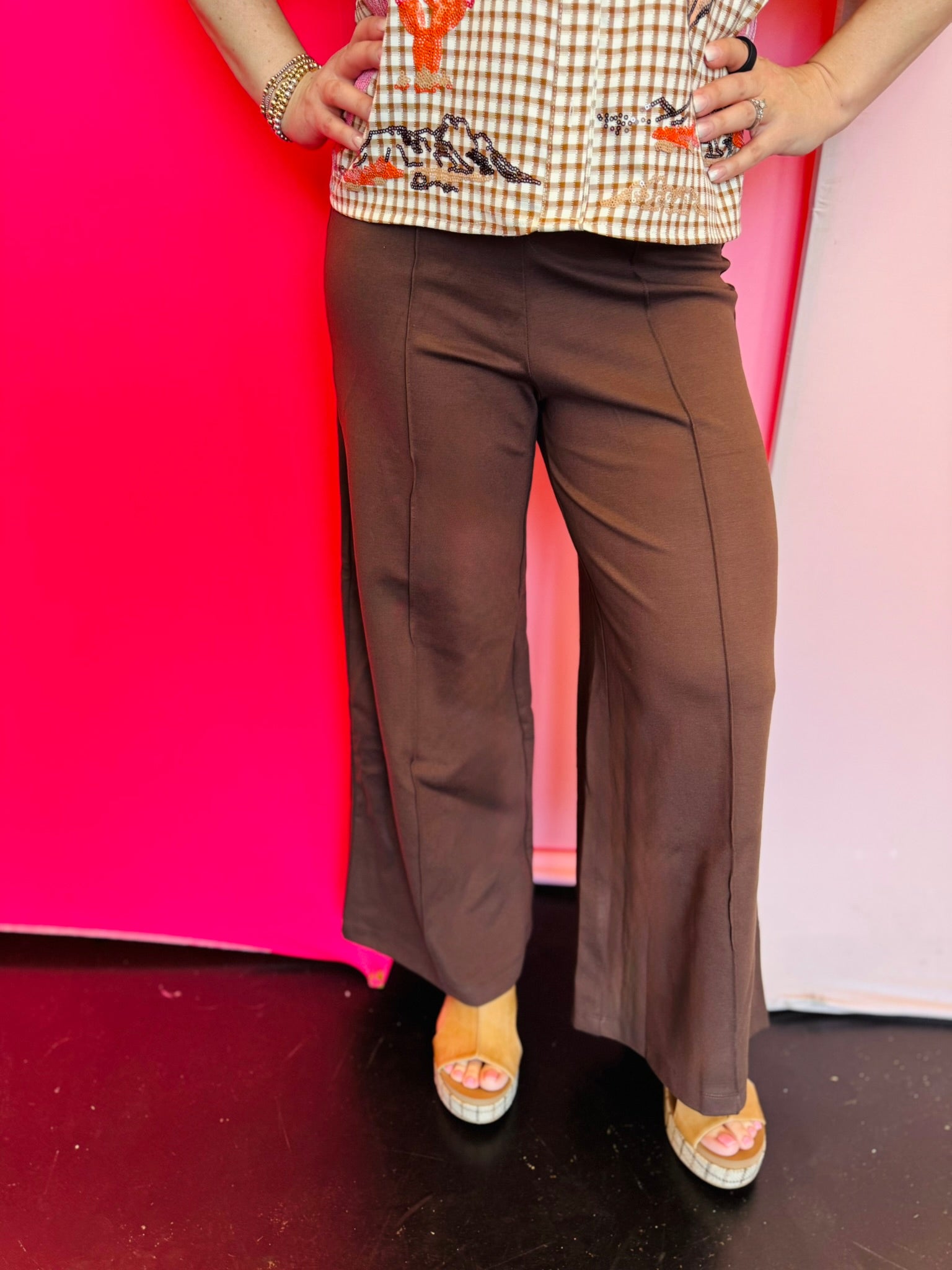 Brown wide leg pants with pintuck seam and elastic waistband