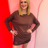 Brown cotton raglan top with thumbhole cuffs.