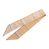 Brown scarf tie with white polka dots and subtle bandana design, doubles as a purse twilly.