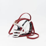 Clear football helmet crossbody bag with burgundy accents, gold hardware, top handle, and adjustable strap.