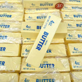 Yellow butter-shaped squishy stress toy with soft sensory texture.