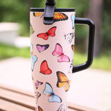 40oz butterfly print tumbler with flip straw lid and handle.