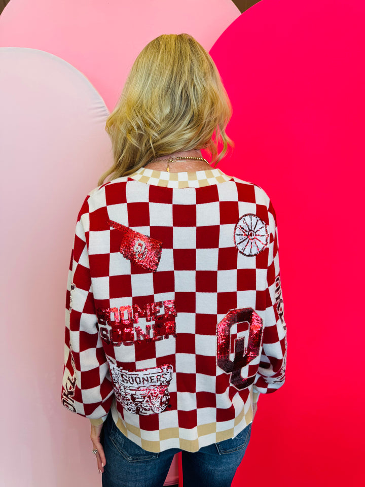 Back side of Queen of Sparkles checkered sequin and rhinestone game day cardigan.