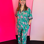 Blakeley Green luxe pajama set with pink cheetahs, stars, and polka dot trim on collar and cuffs.