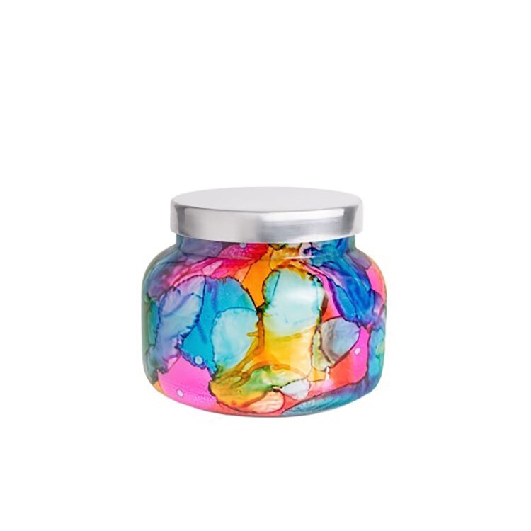 Rainbow watercolor glass jar candle with vibrant colors and a tropical fruit and citrus Volcano scent; decorative 19oz candle for home fragrance and style.
