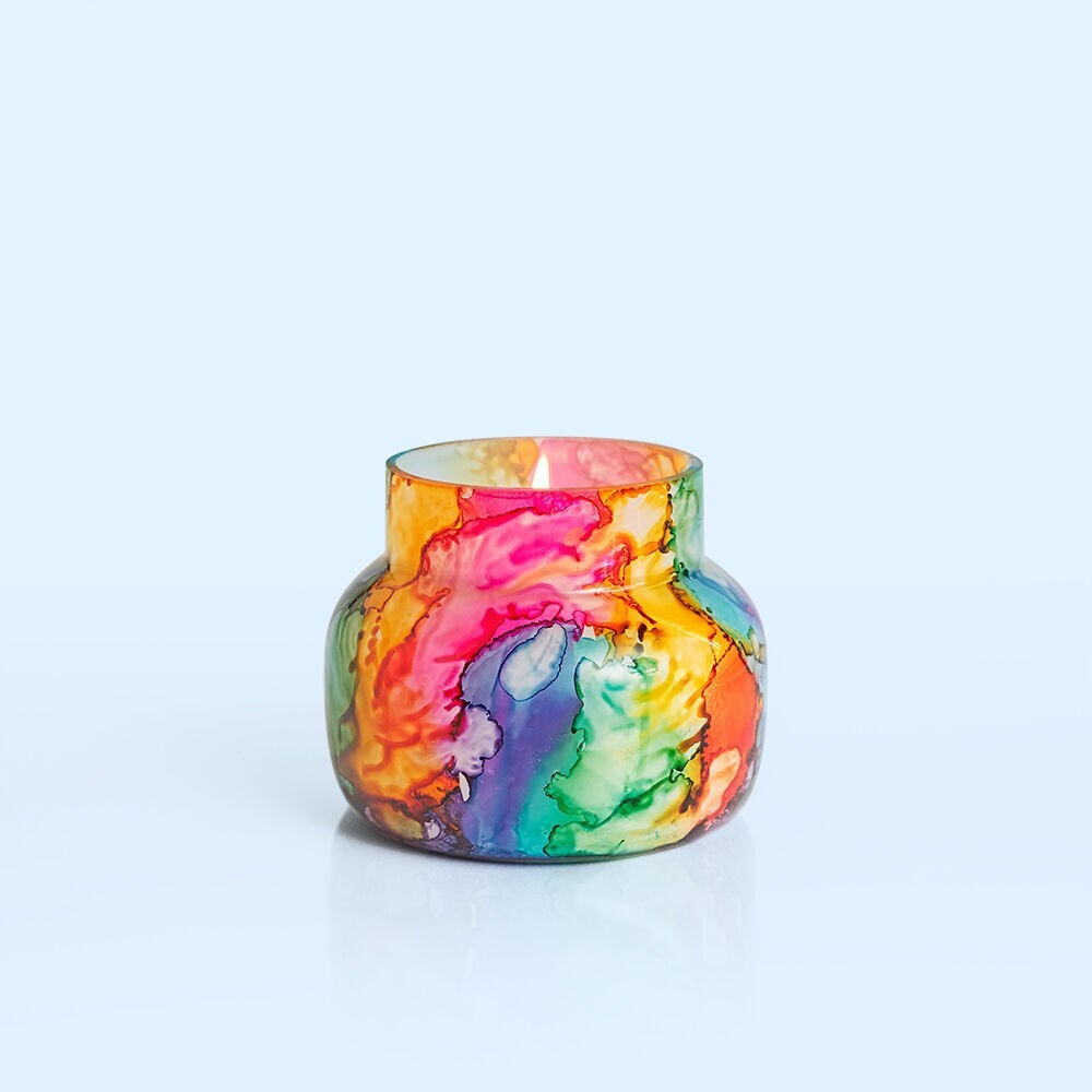 8oz Volcano Petite Rainbow Watercolor Jar candle with tropical citrus scent and eco-friendly wax in a colorful, decorative glass jar.