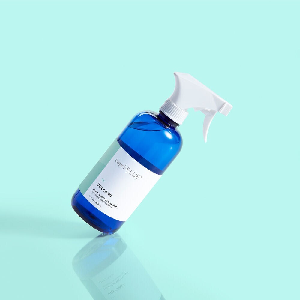 Volcano Multi-Surface Cleaner bottle with refreshing citrus scent and grapefruit essential oil, designed to clean and freshen a variety of surfaces.